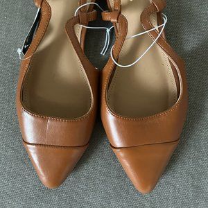 Express tan faux leather slip ons